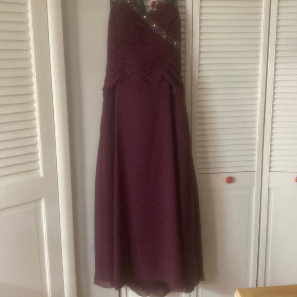Beautiful detailed plum evening gown